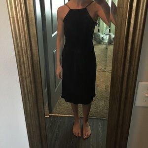 little black dress, cut out back, high slit